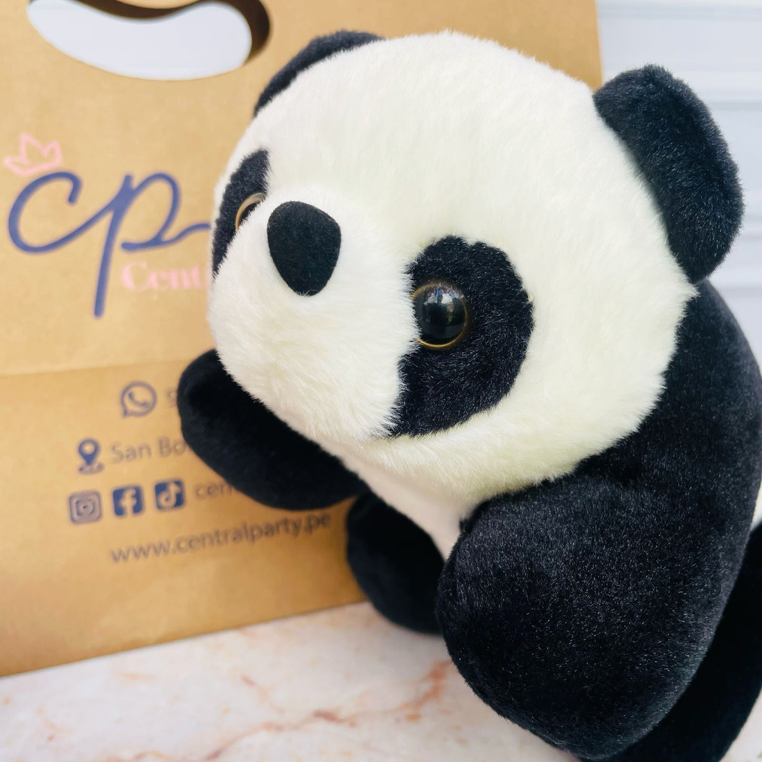 Peluche oso panda mediano
